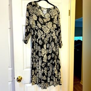 Olive UK sheer black and cream knee length dress European size 1